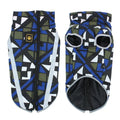 Dog wearing reflective winter jacket with geometric pattern design