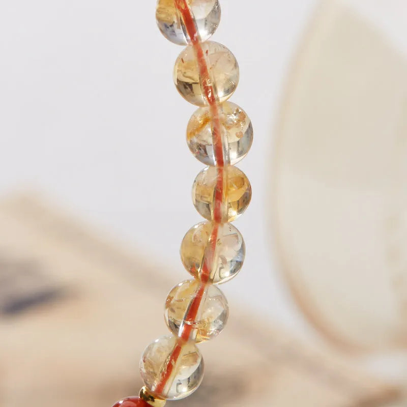 Hand-woven citrine five sutra bracelet with 6mm crystal beads in geometric pattern