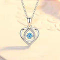 Blue diamond heart pendant necklace and matching bracelet jewellery set on copper