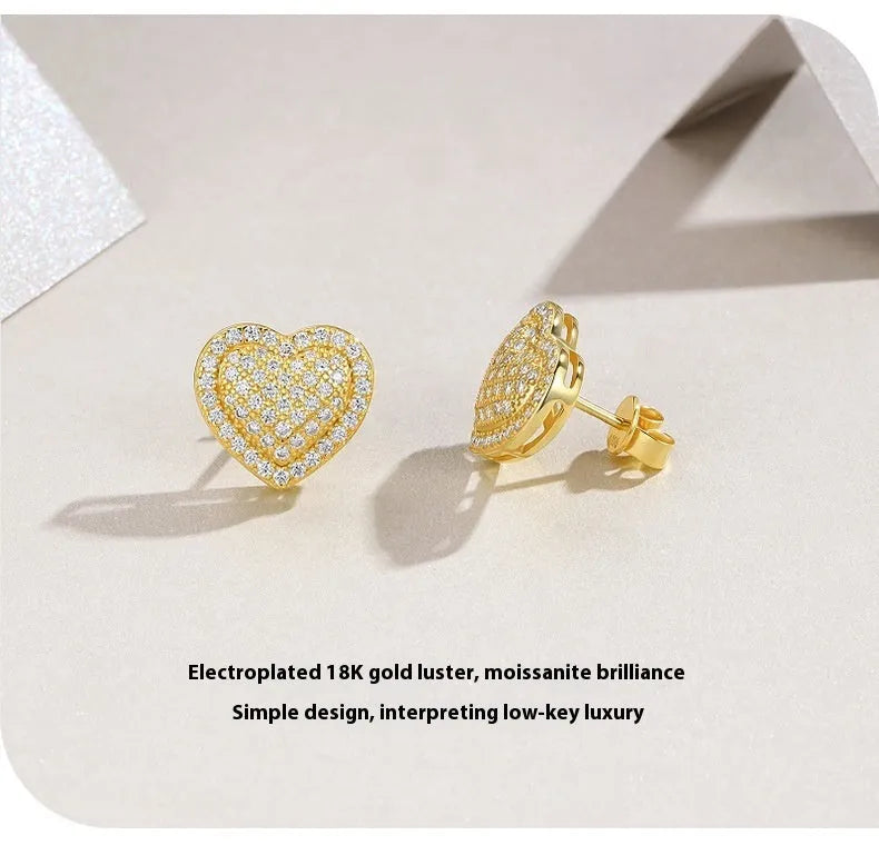 Golden heart-shaped moissanite stud earrings with S925 silver construction and simple fashion design