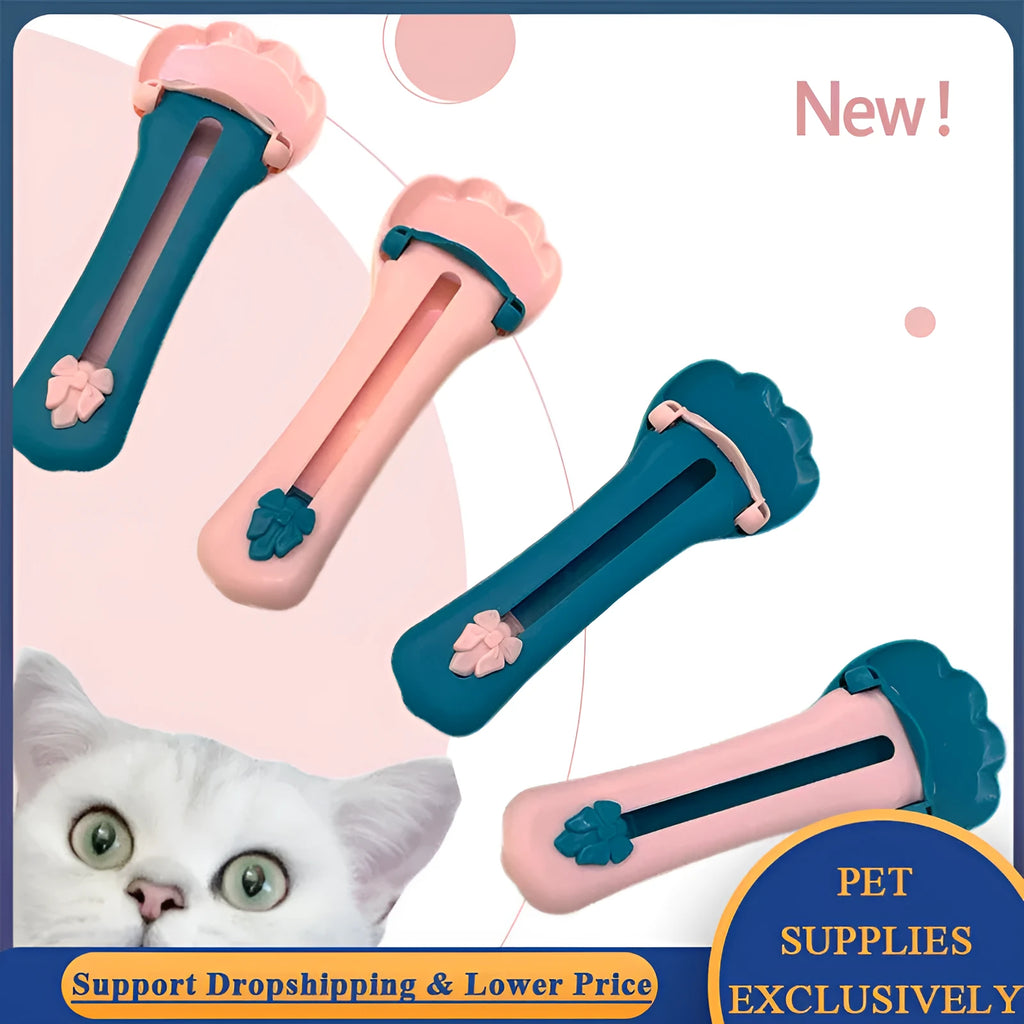 Green and pink pet feed spoon with silicone barrel for squeezing out sticky dog or cat food.