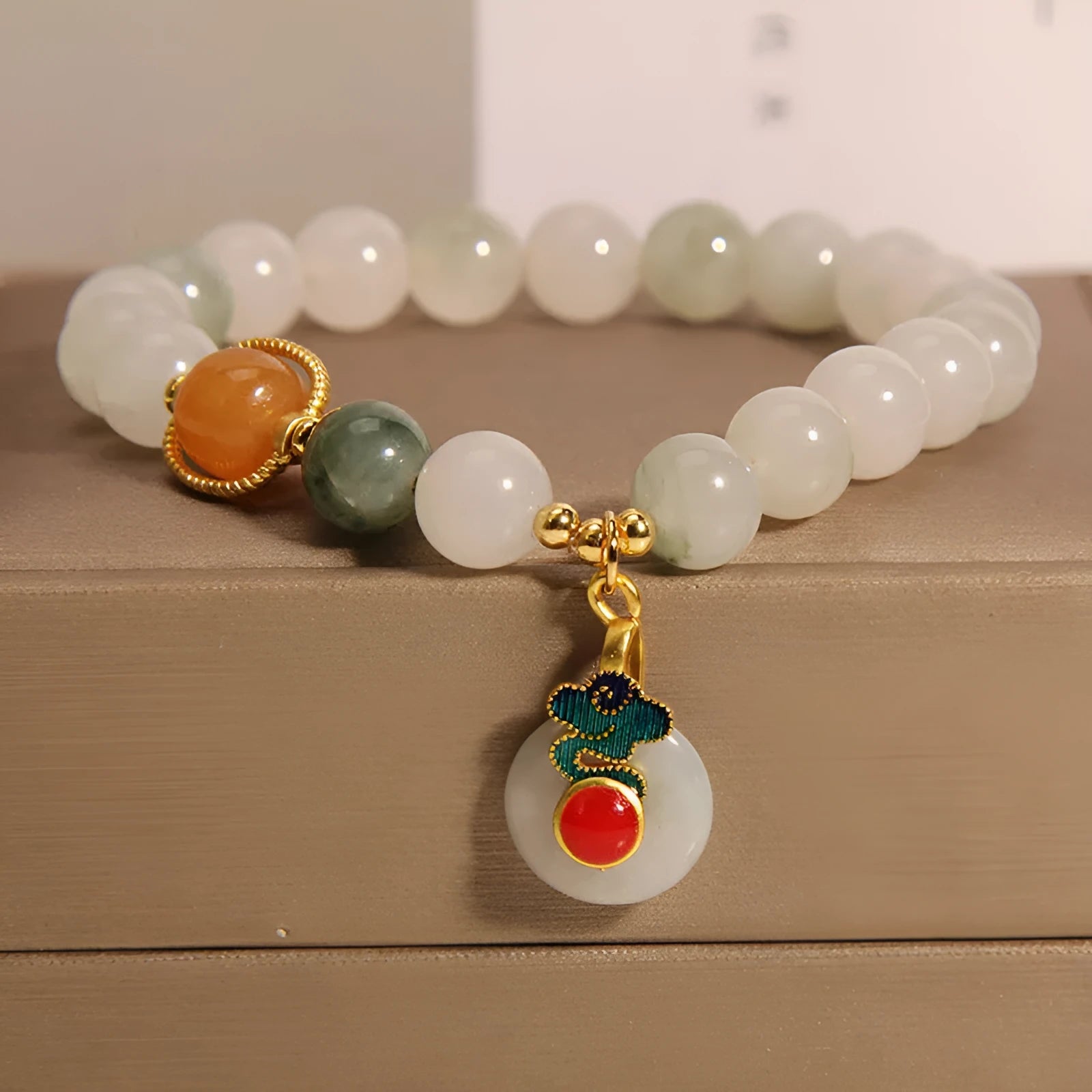 Ice jade women's bracelet with Xiangyun peace buckle and pearl decorative elements