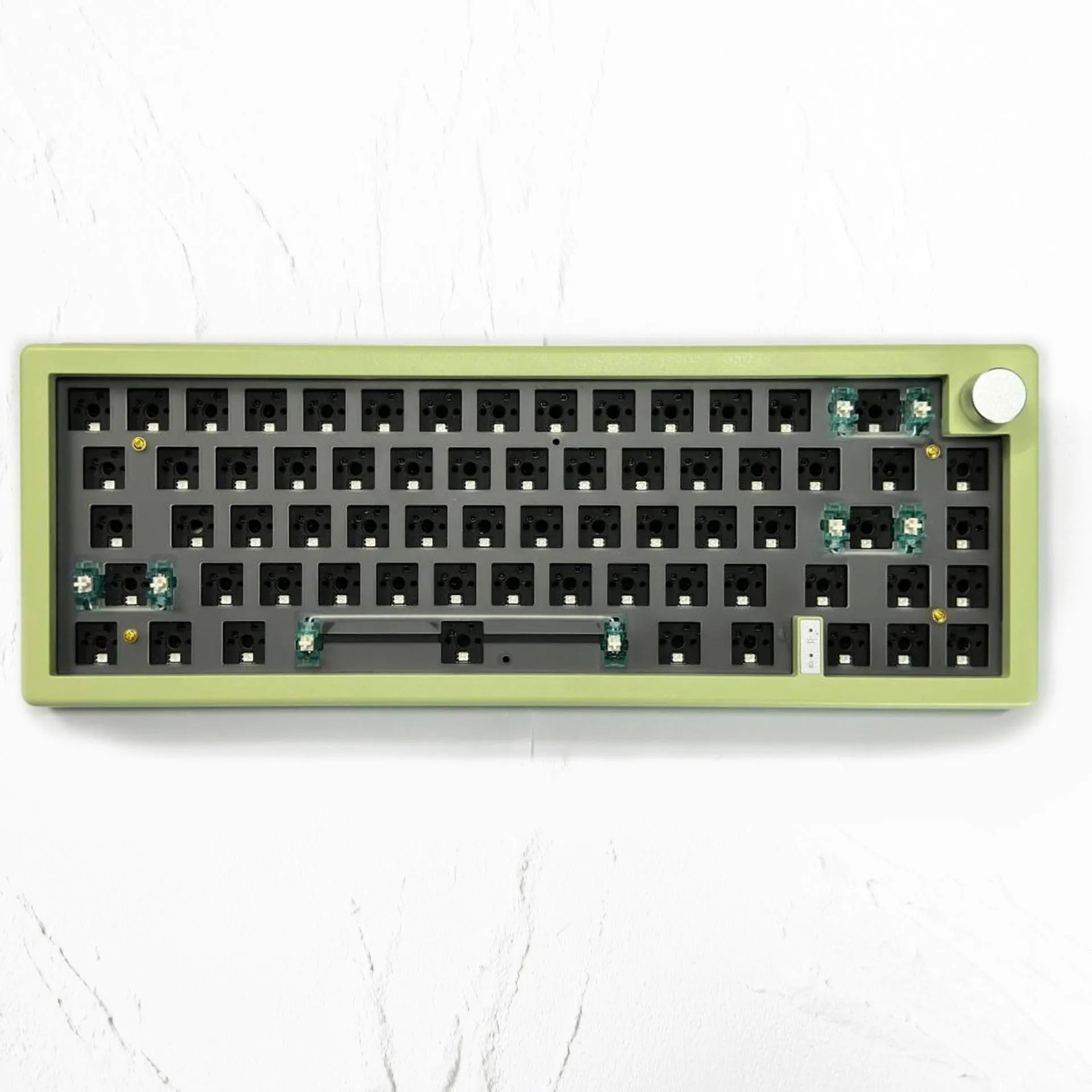 DIY mechanical keyboard kit with RGB lighting and control knob in seven colour options