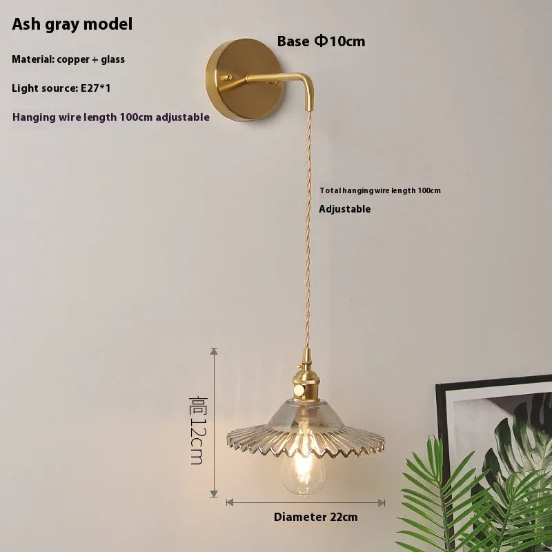 Brass lotus wall lamp with glass shade in six colour options