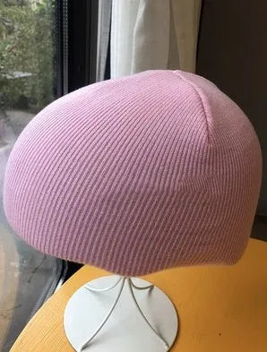 A size L decorative cover for a ski helmet, shown in one of fifteen available colour options.