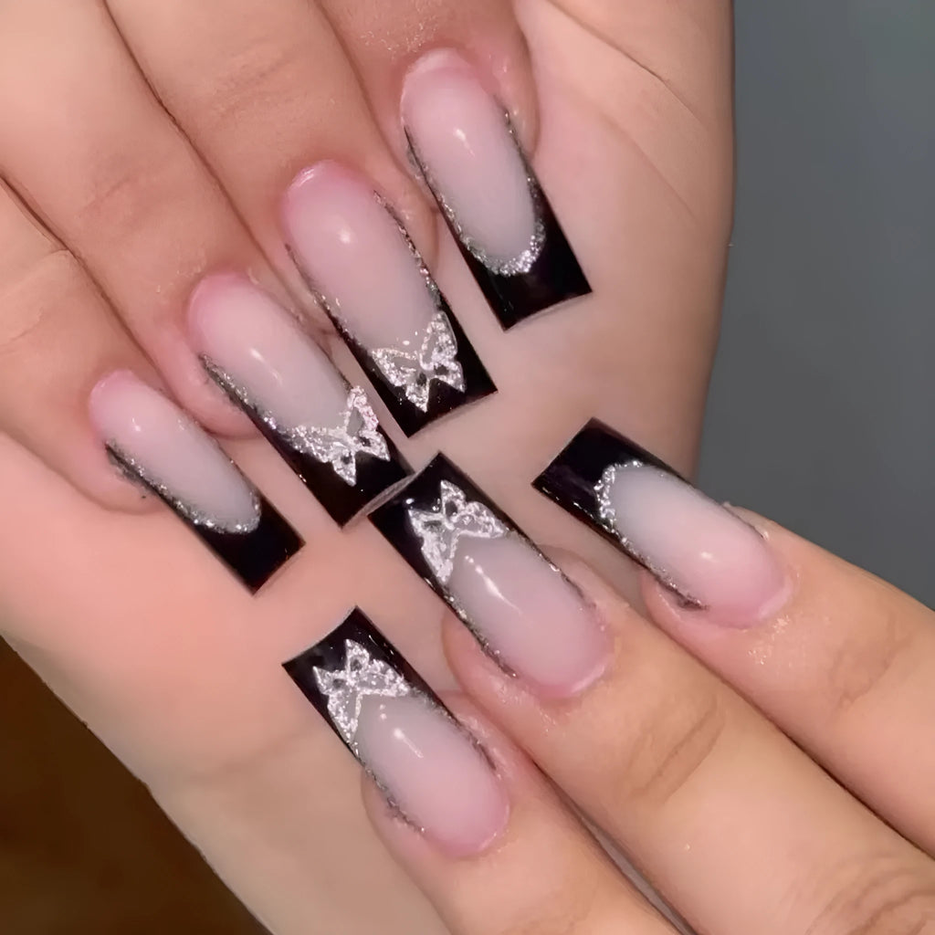 Black French style thin glittering butterfly nail armour set on medium-length nails