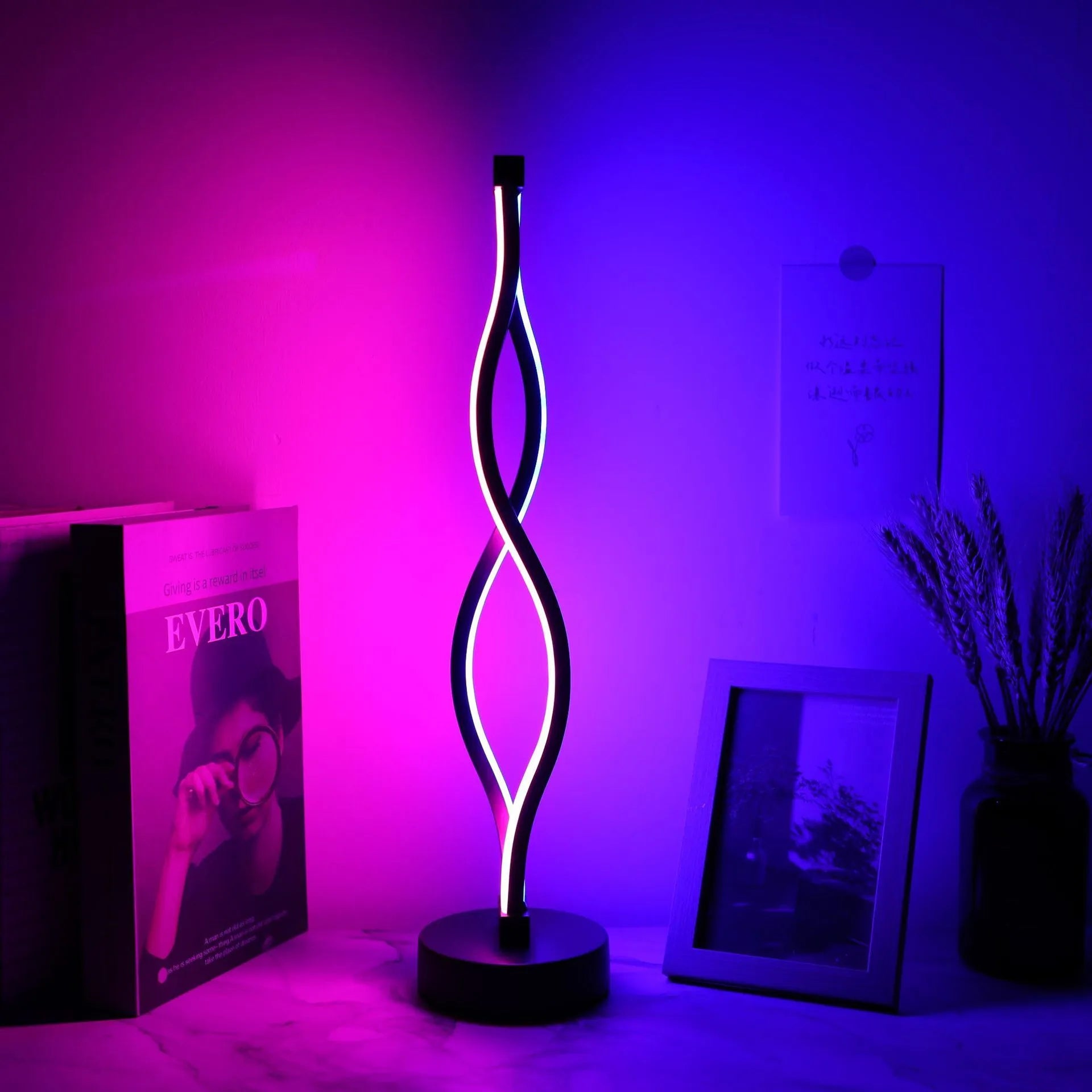 Black aluminium USB desk lamp with three-colour button dimming on a desktop surface