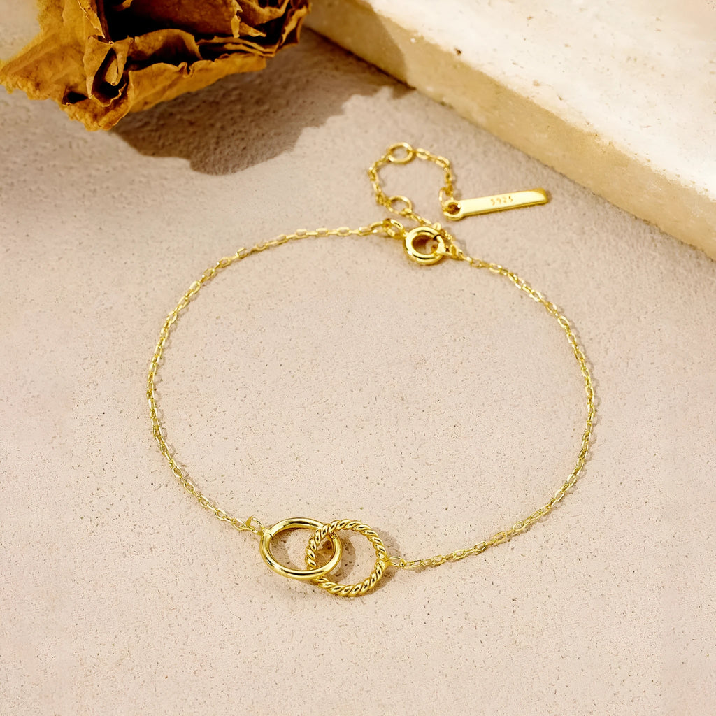 S925 sterling silver interlocking bracelet with round diamond inlay for women in 18K gold finish