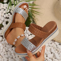 Gold and silver women's plus size wedge sandals with PU upper and rubber sole.
