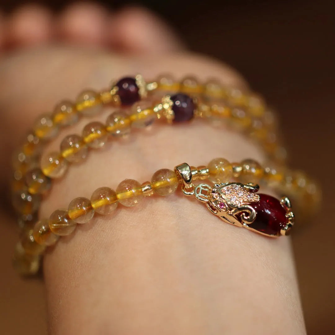 Natural Brazilian gold rutilated quartz bracelet with three gold rings in Chinese style design