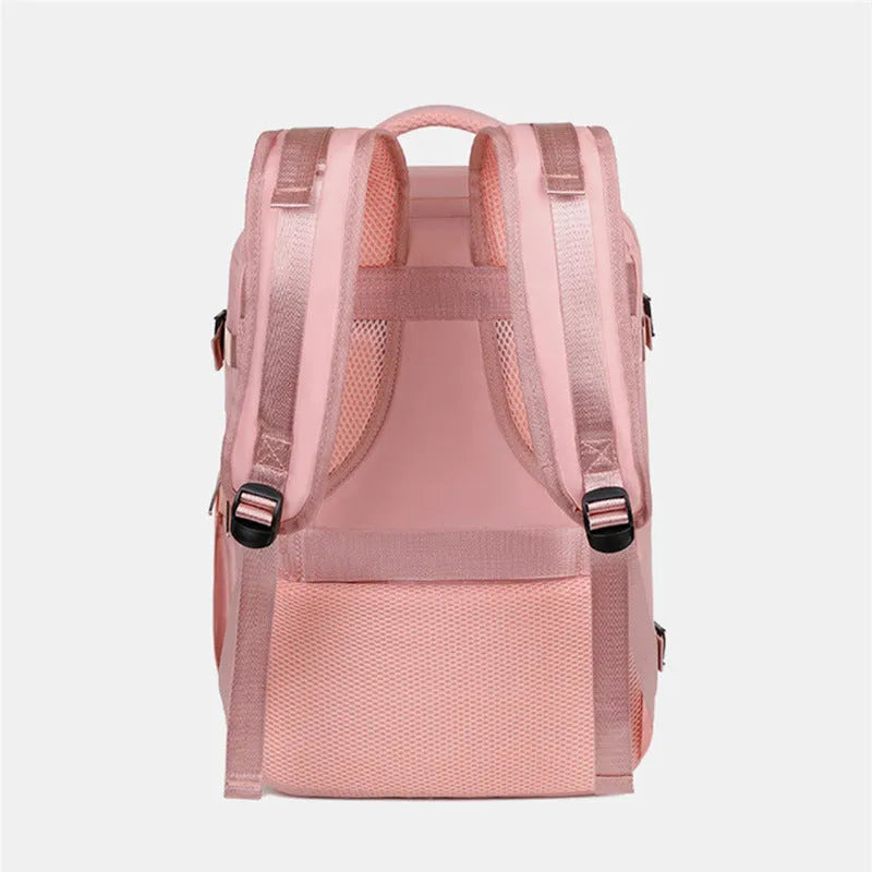 Large purple travel backpack with multiple compartments, shown with a laptop and organised interior.