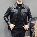 Men's quilted PU leather jacket with short length, side pockets, on a hanger