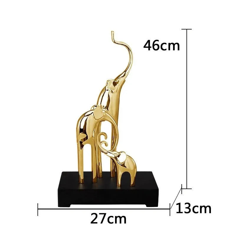 European style resin elephant decorative ornament in bright gold finish displayed on wooden surface