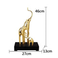 European style resin elephant decorative ornament in bright gold finish displayed on wooden surface