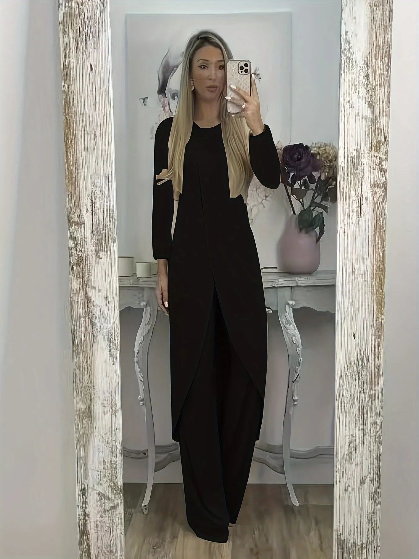 A loose-fitting long sleeve two-piece lounge set in polyester, shown in black, blue, and khaki colour options.