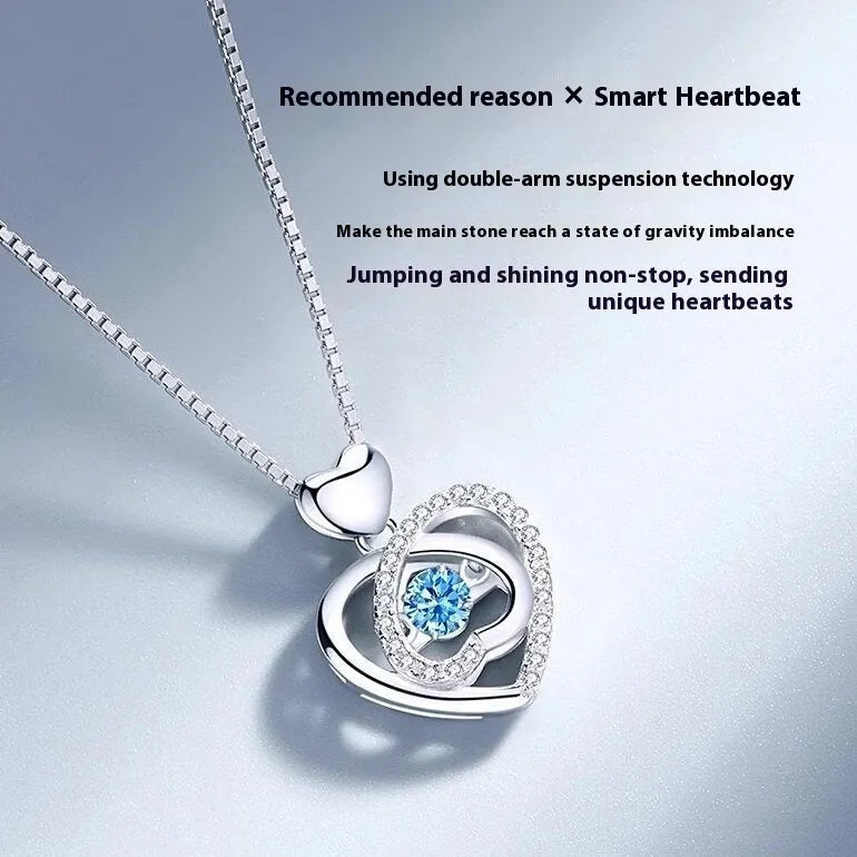 Blue diamond heart pendant necklace and matching bracelet jewellery set on copper