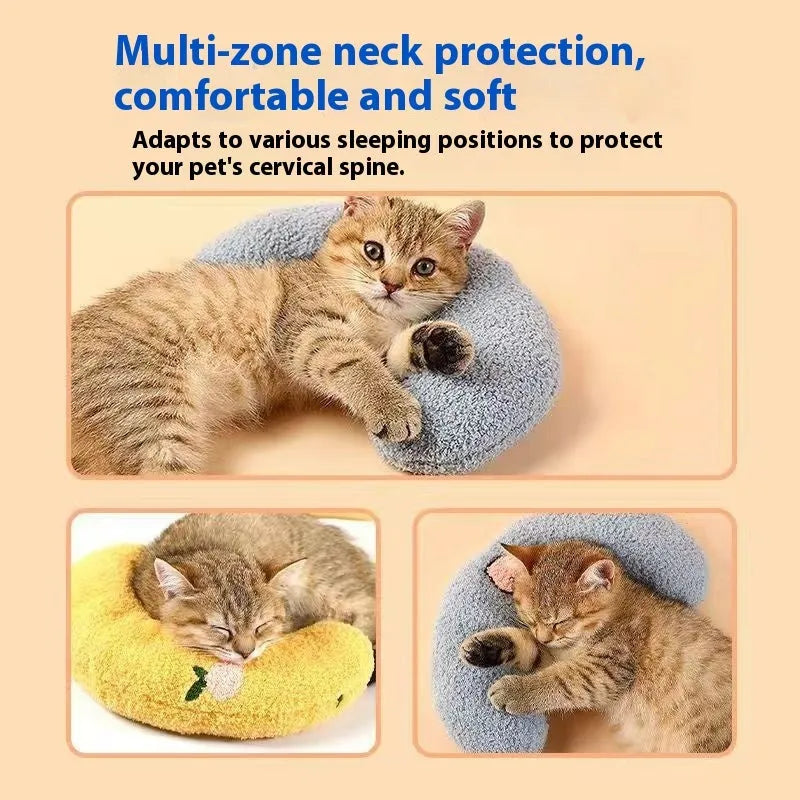 Blue question mark shaped cloth pillow for cat neck support on a pet sleeping mat