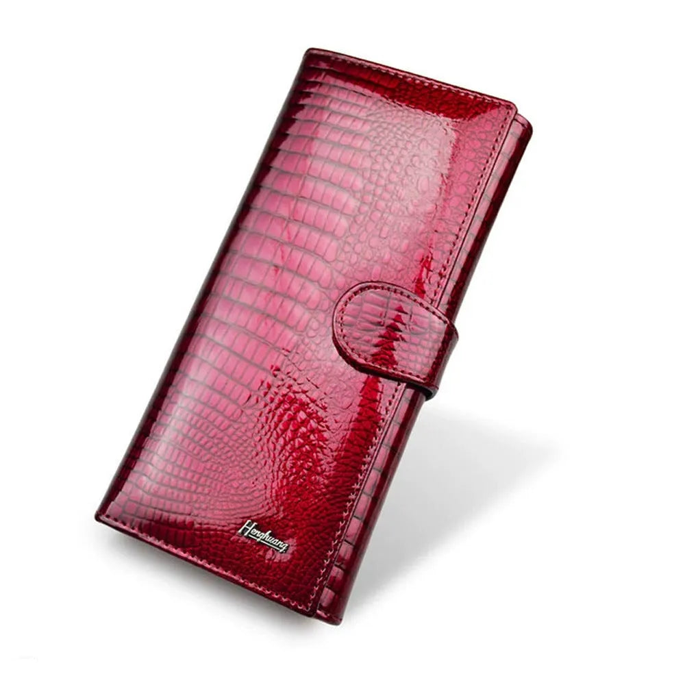 Women's patent leather coin purse with crocodile pattern design in wine red colour