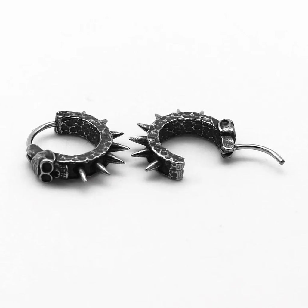Geometric black motorcycle earrings with copper plastic punk detailing on alloy backing
