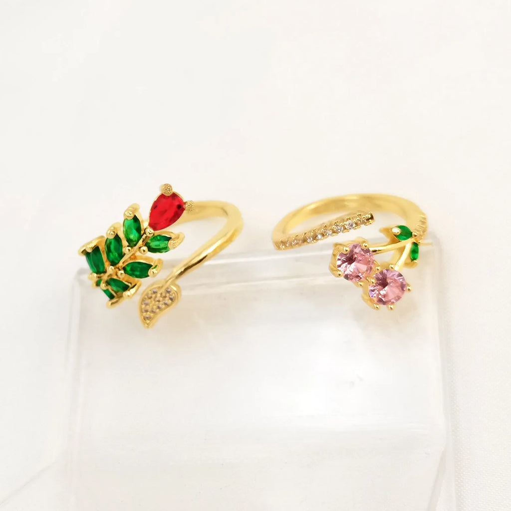 Copper geometric open ring with detailed leaf pattern and gold zircon accents