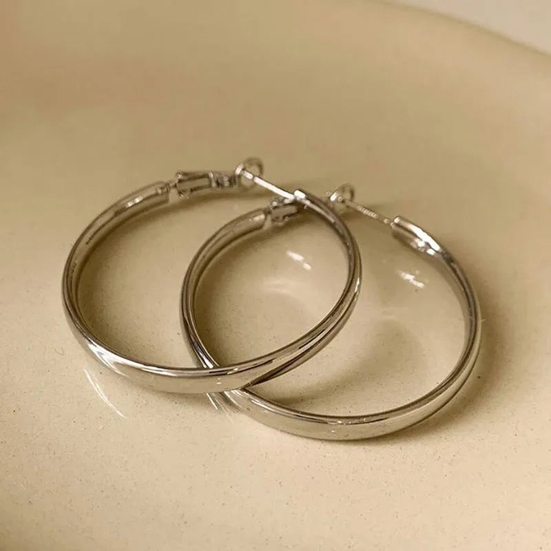 Gold and silver 40mm copper circle hoop earrings with electroplated finish