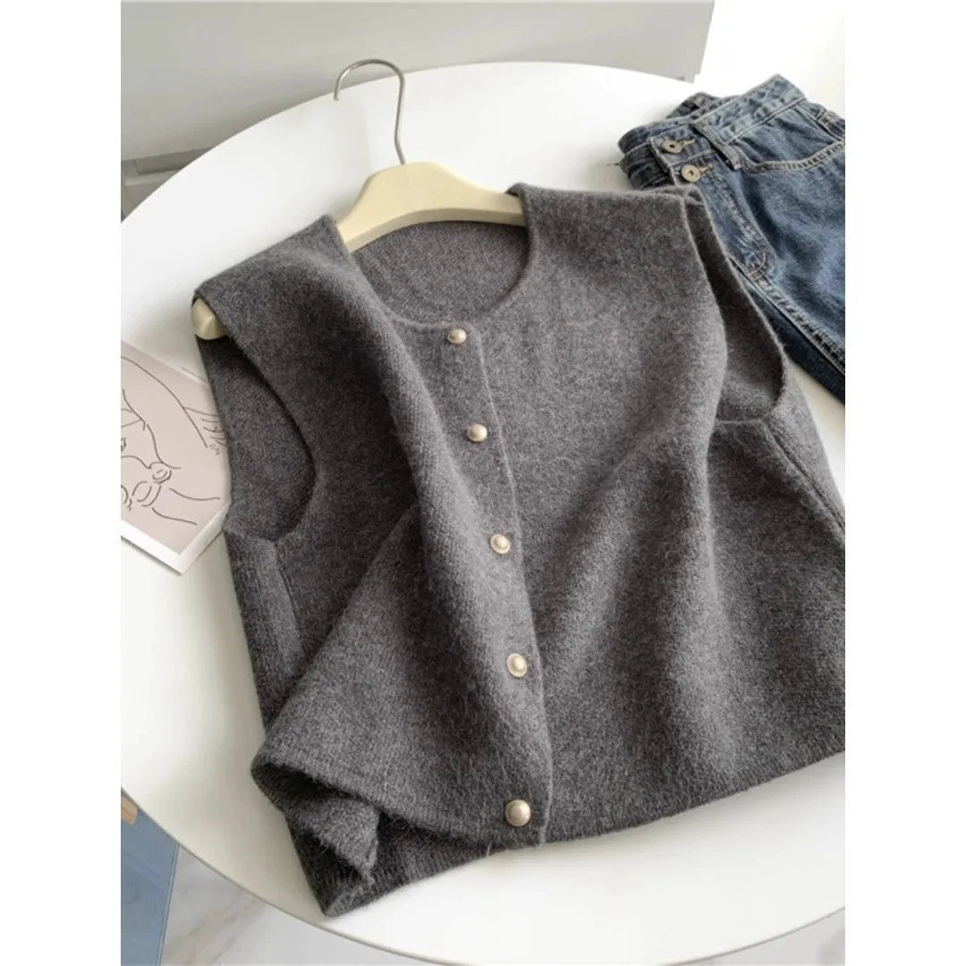 Women's grey V-neck polyester pullover vest with half-length sleeves laid flat
