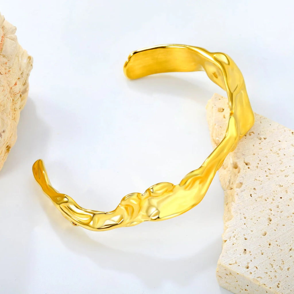 Stainless steel alloy bracelet in gold, rose gold, and silver tone colour options.