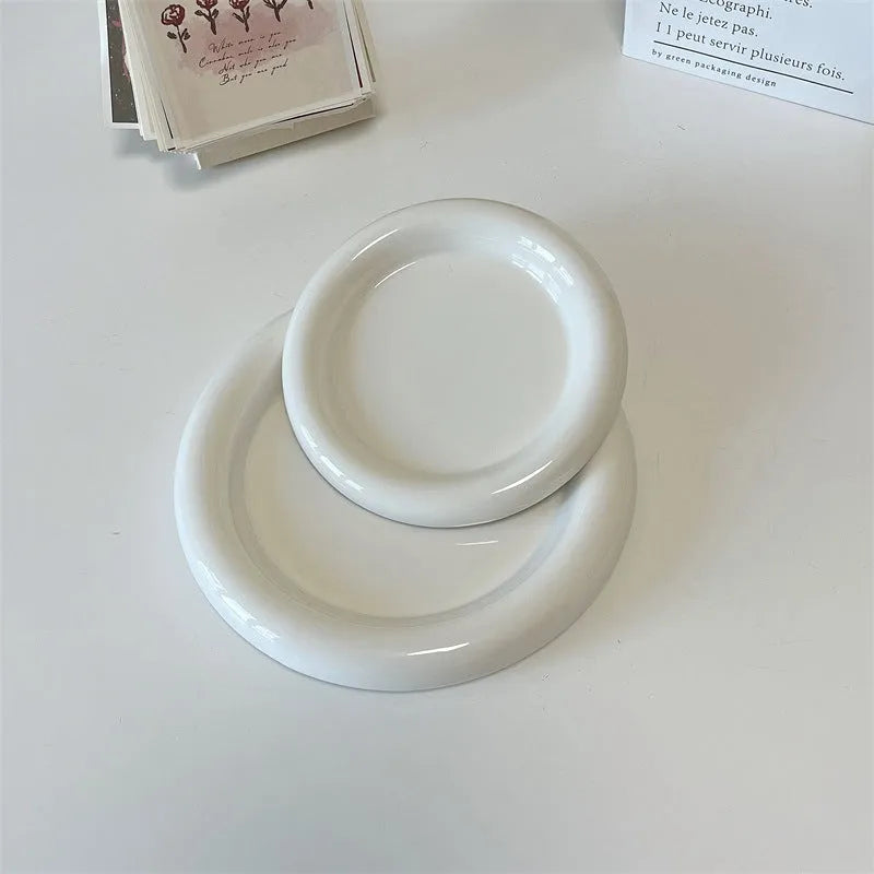White porcelain plate with bear doodle or round doodle design, shown in 15cm and 20cm sizes.