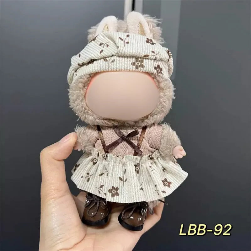 Plastic doll costume for a 17cm tall vinyl fashion figurine on a white background.