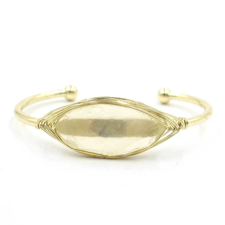 Raw gemstone winding bracelet with 8mm amorphous crystal beads in various colours on a white background.