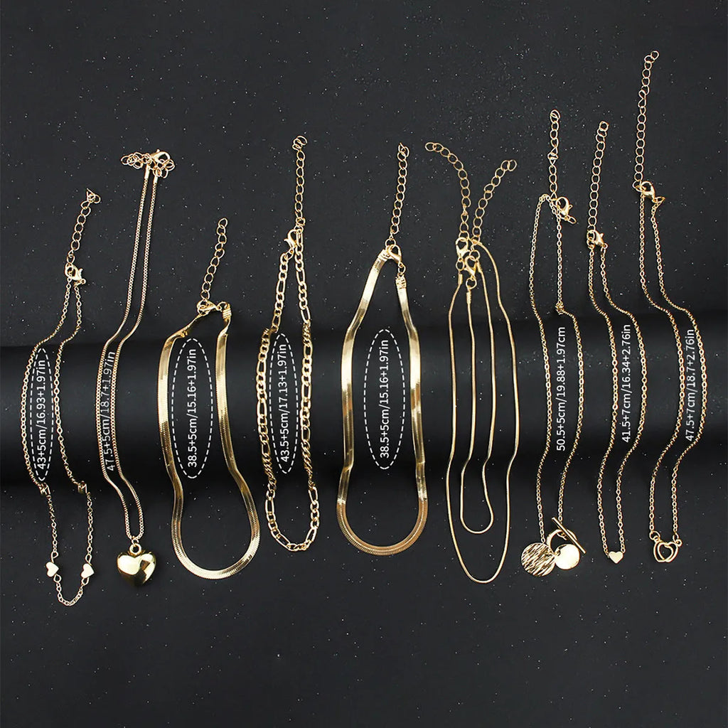 10 piece gold necklace set with snake bone chain and alloy pendants