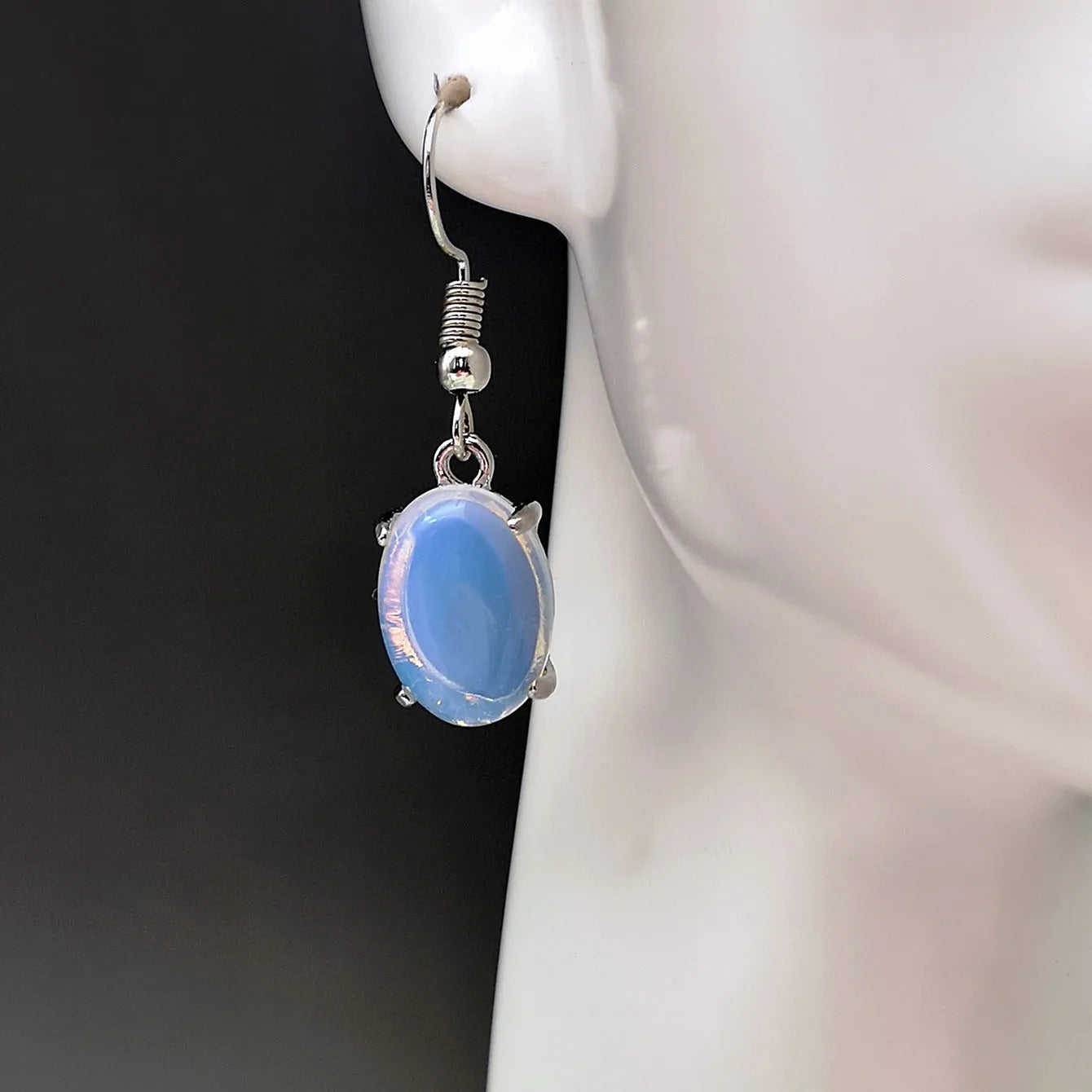 Opal earrings with retro moonstone cross design in drop shape and electroplated alloy construction