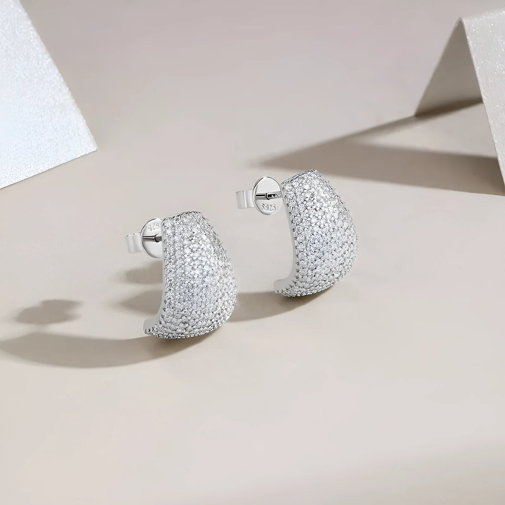 Geometric shaped S925 sterling silver stud earrings with moissanite stones.