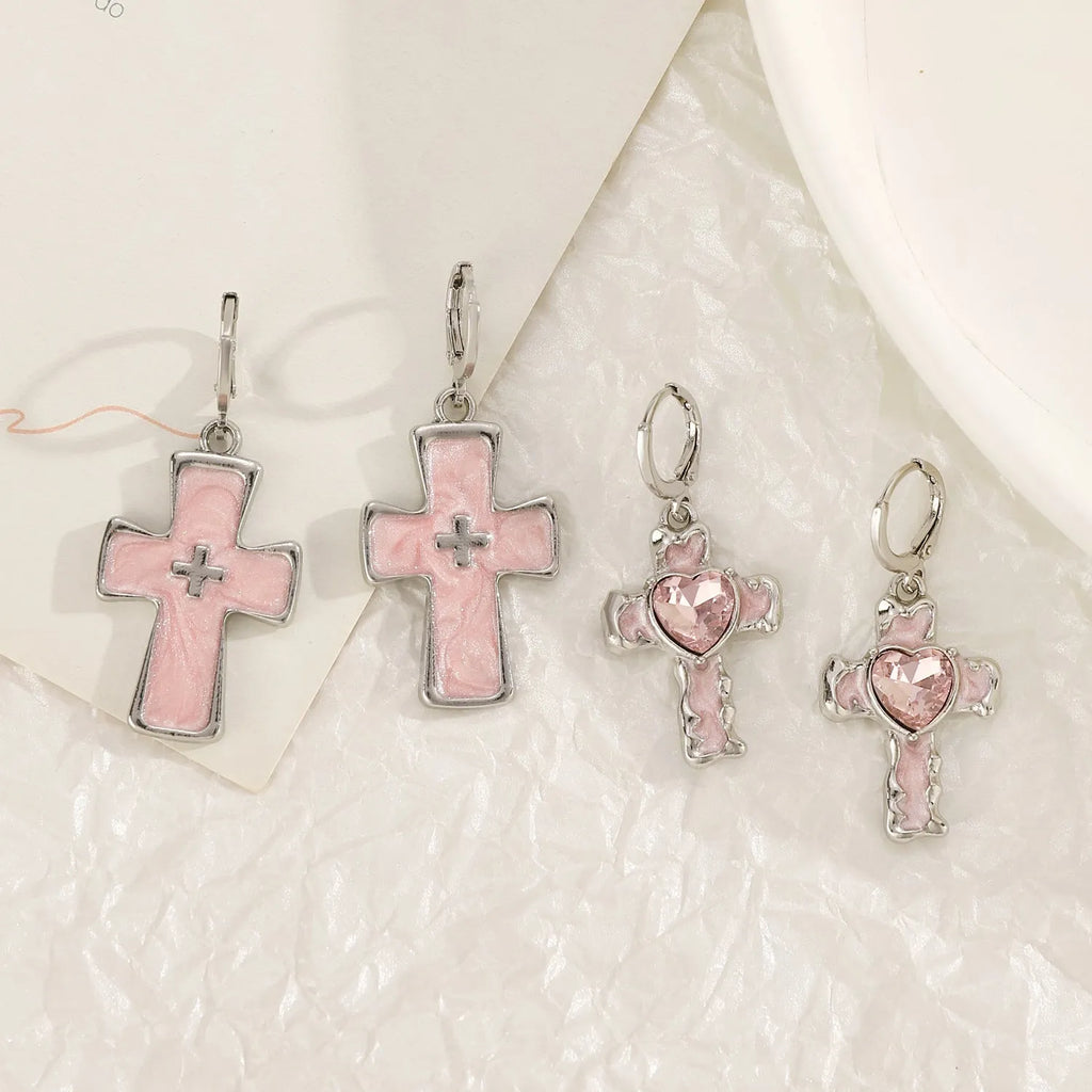 Women's alloy cross crystal earrings in white, bright black, and antique silver colours with geometric animal designs