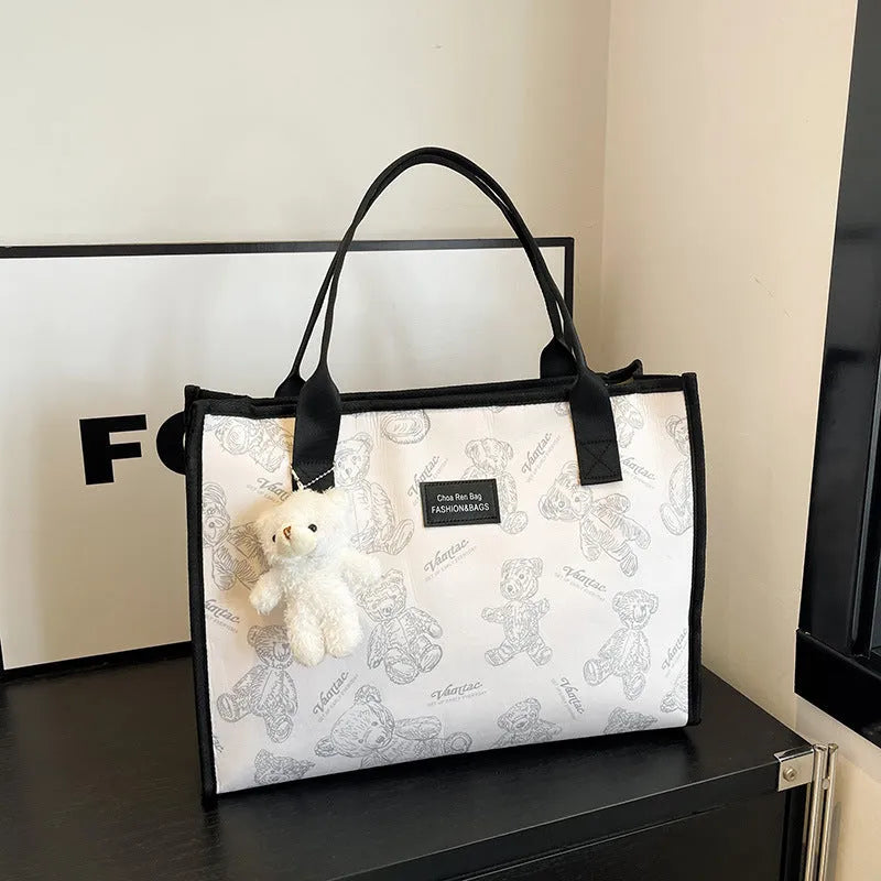 Women's printed canvas tote bag with rhombus pattern in black or white colour options