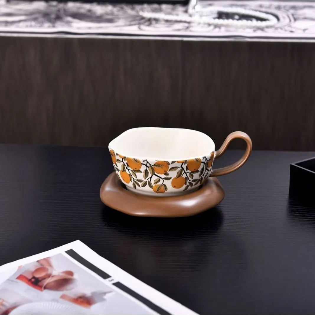 Antique style ceramic coffee cup and saucer set in black or orange with 210ml capacity