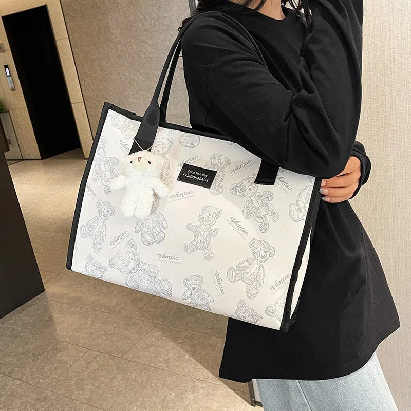Women's printed canvas tote bag with rhombus pattern in black or white colour options