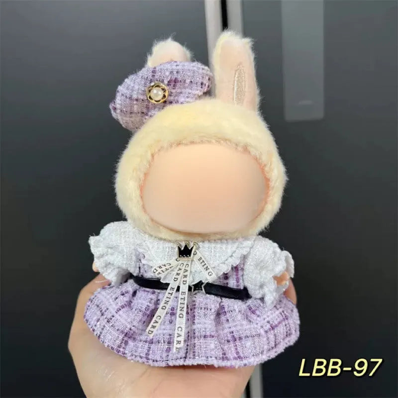 Plastic doll costume for a 17cm tall vinyl fashion figurine on a white background.