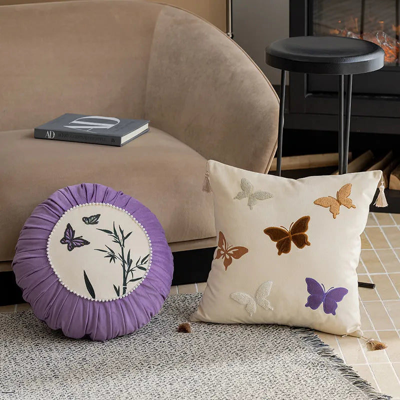 Square butterfly embroidered cushion in beige, black, or purple colour options