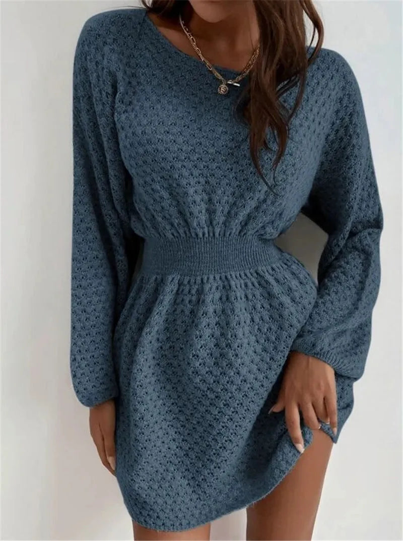 Blue women's knitted dress with hand-crocheted flower decoration and fitted waist design