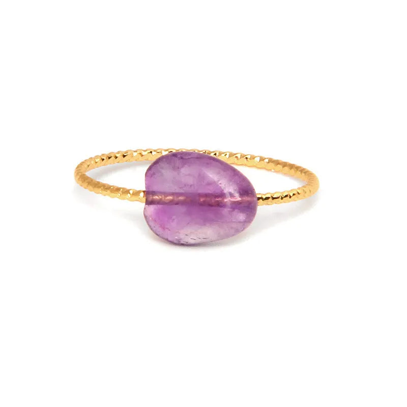 Geometric-shaped coloured agate ring for women with a polished stone finish, showing niche design details.
