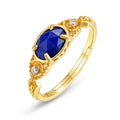 Geometric silver alloy ring with oval lapis lazuli stone in deep blue colour