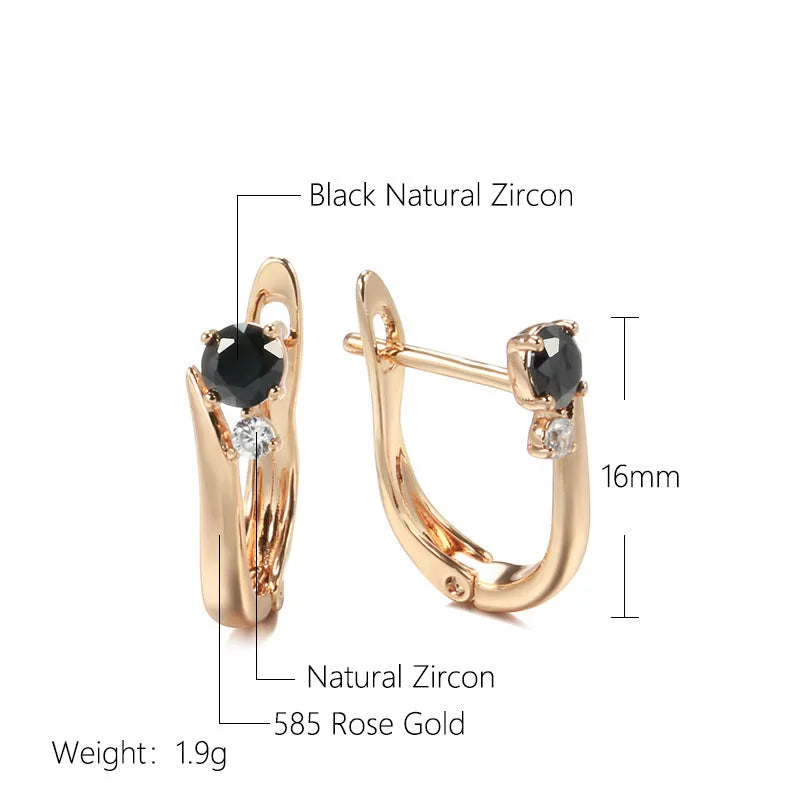 Gold geometric drop shape earrings with retro design and stone inlay on copper.