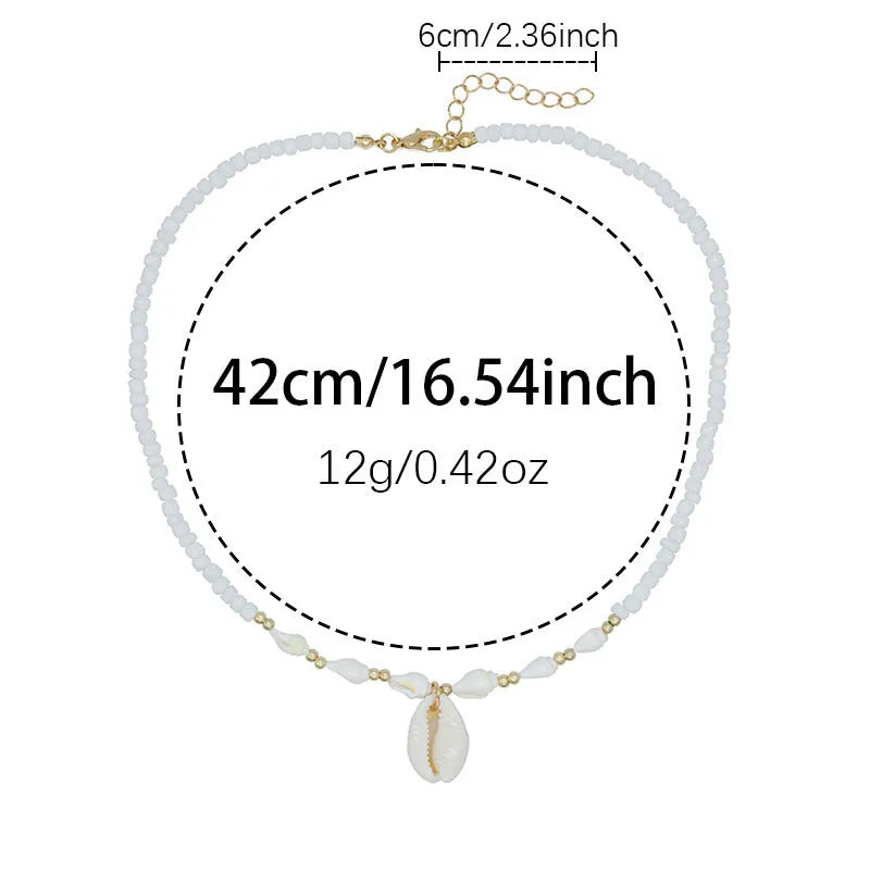 White Mother of Pearl conch shell necklace with regular chain on display