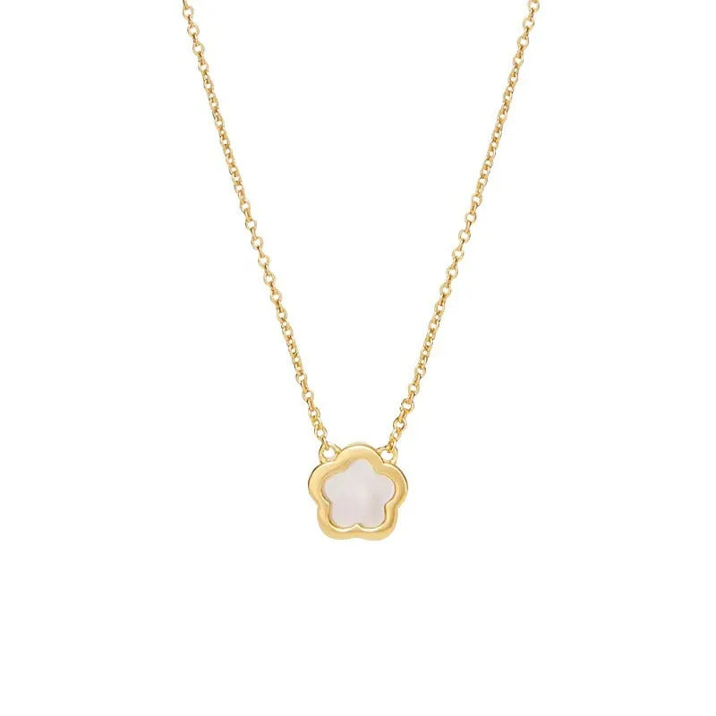 White mother of pearl shell flower necklace on a chain, shown in silver and gold tone finishes.
