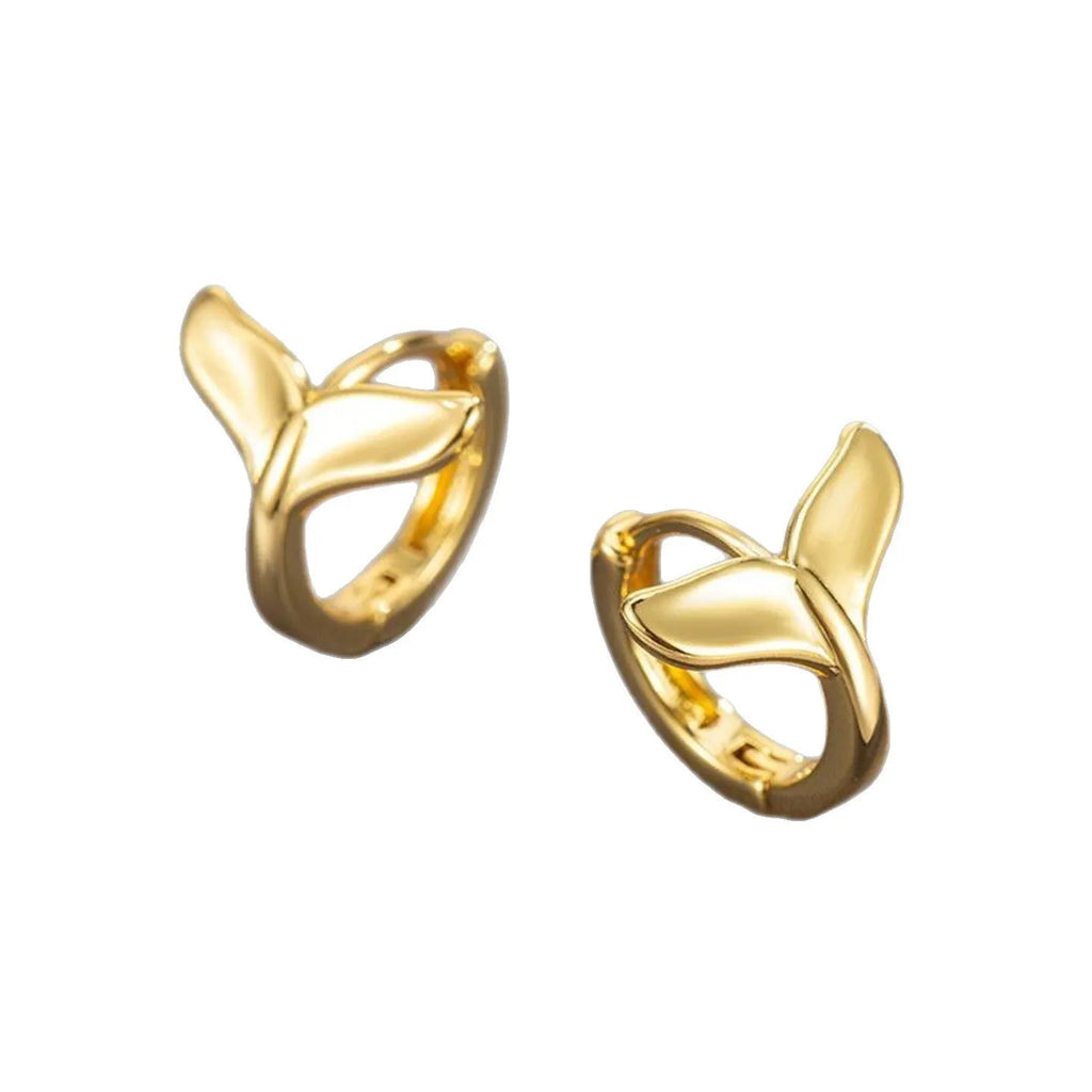 A pair of women's simple fishtail design earrings with an electroplated finish in white gold or yellow gold colour.