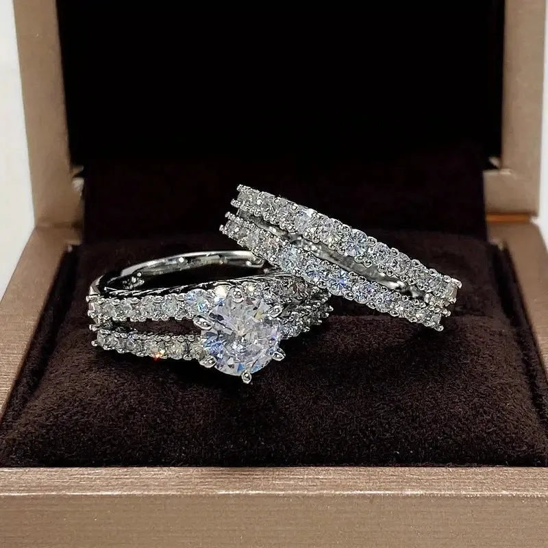 Women's 2-in-1 fully jewelled ring set in geometric design with round elements, shown in gold, rose gold, and silver finishes