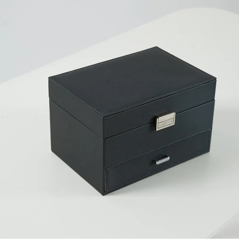 Hard-sided PU leather jewellery storage box in a solid colour.