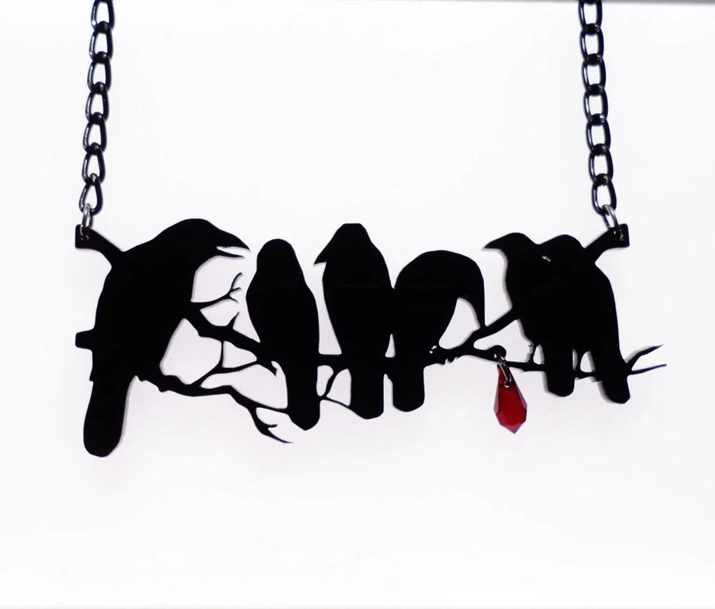 Black crow necklace on cross chain with electroplated finish and animal modelling