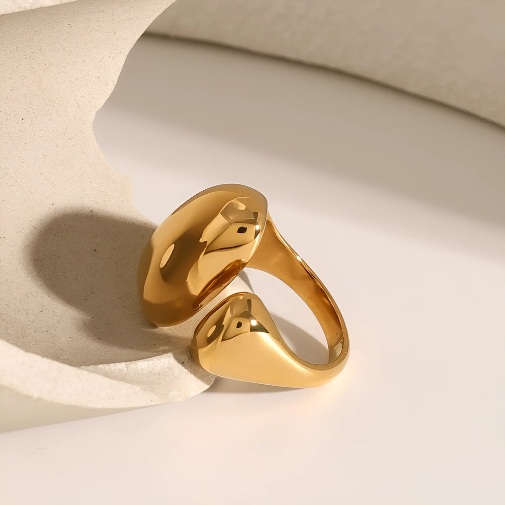 Women's exaggerated open geometric ring in stainless steel with electroplated finish.